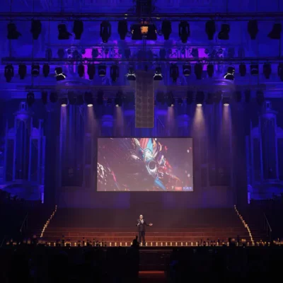 A performer on stage at the Sydney Town Hall